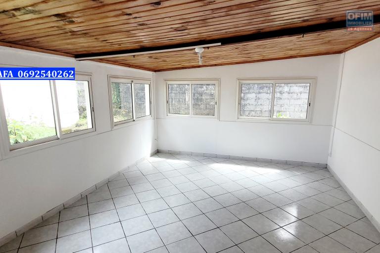 Maison de type F4 de 110,54 m2, jardin - salle à manger